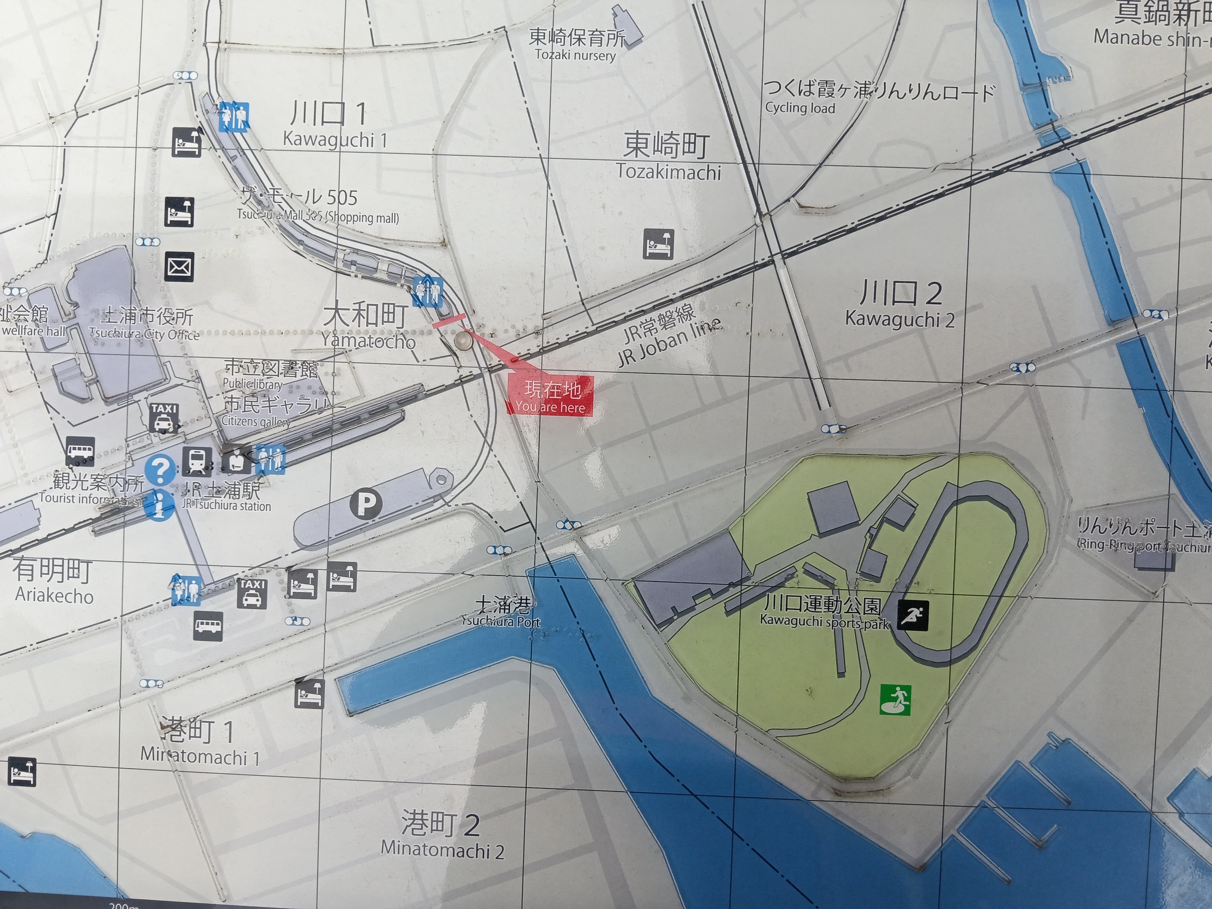 かすみがうらマラソン2026 会場案内図パネル — スタート地点と手荷物預かり所の位置